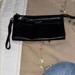 Coach Black leather Wristlet Clutch good condition see pic on corner